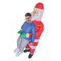Man being carried by inflatable Santa costume